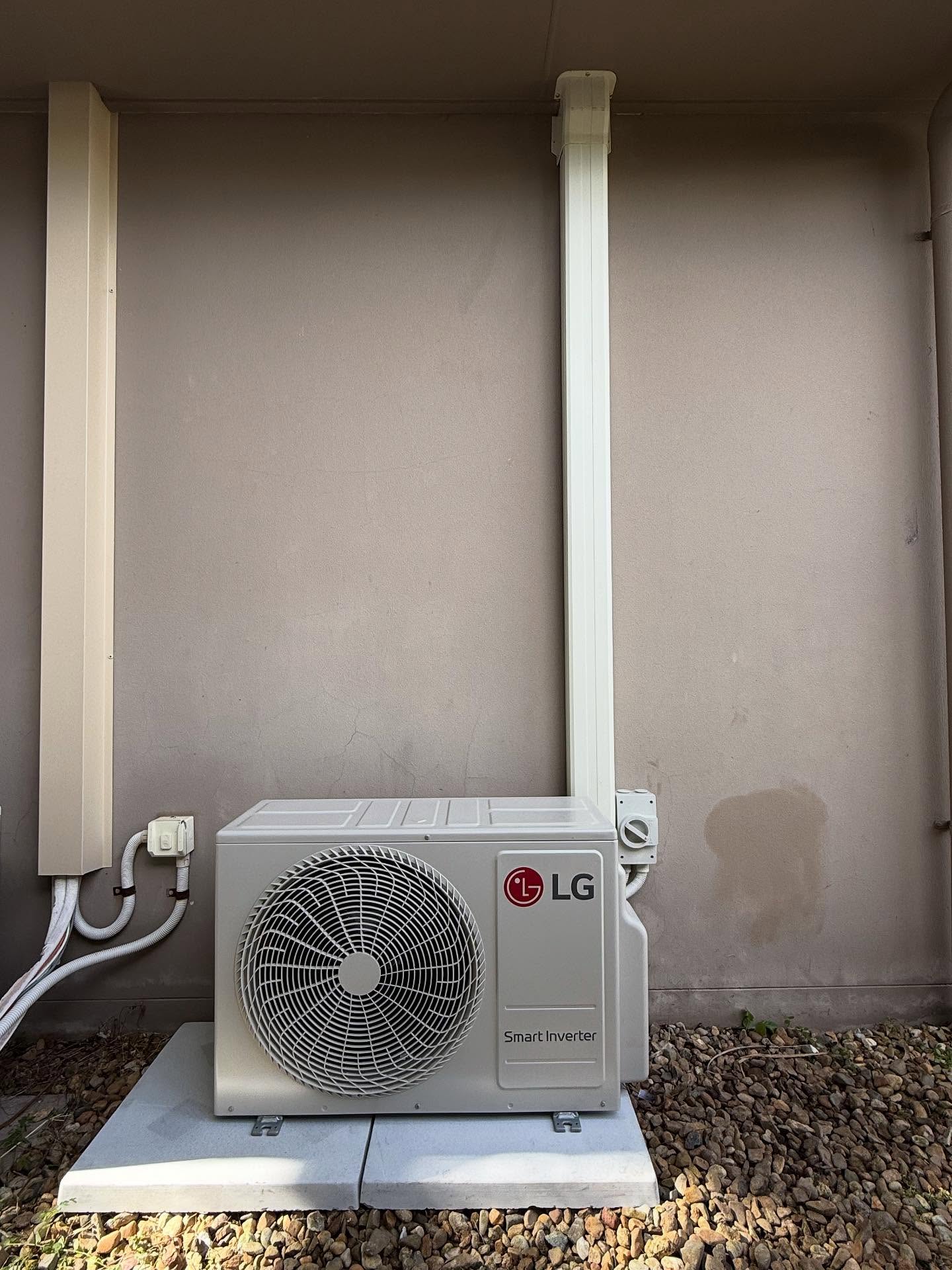 LG Smart Inverter outdoor unit installed on render